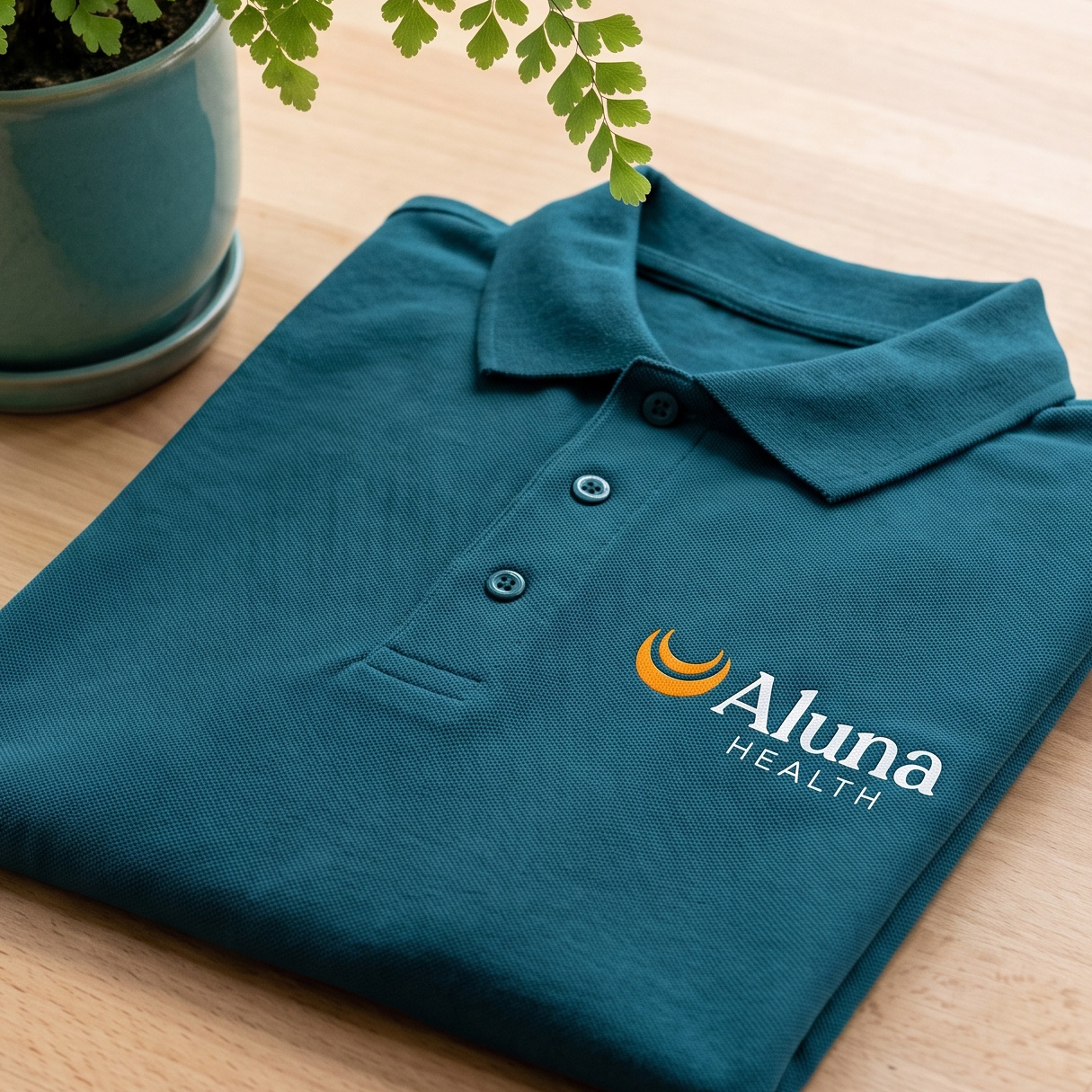 Aluna Health branding on uniform